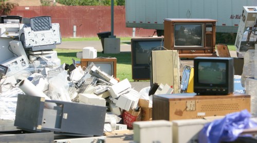 Professional garage clearance team at work